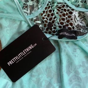 Turquoise Lace Body Suit from PrettyLittleThing